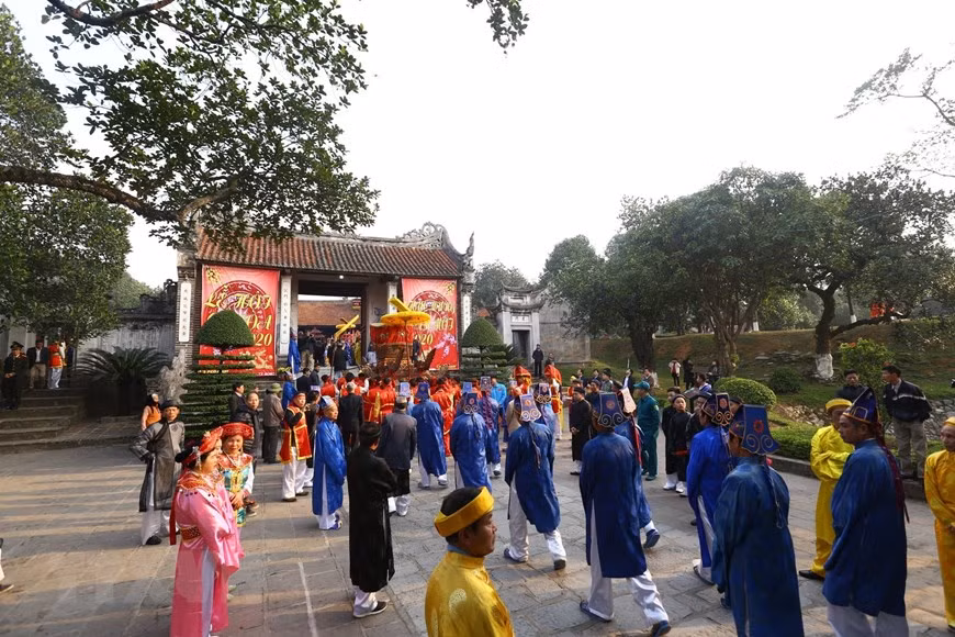 La grande procession de l’invocation de 12 hameaux et de 7 villages fraternels. Photo: VietnamPlus 