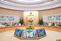 Le Premier ministre Pham Minh Chinh préside la réunion périodique du gouvernement de février. Photo: VNA