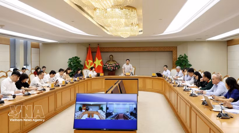 La quatrième réunion du Conseil exécutif du Centre financier international du Vietnam, tenue le 22 octobre à Hanoï. Photo: VNA