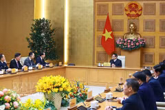 Le Premier ministre Pham Minh Chinh reçoit l'ambassadeur de Chine au Vietnam, He Wei. Photo : VNA
