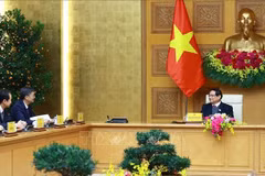 Le Premier ministre Pham Minh Chinh reçoit Chen Gang, membre du Comité central du Parti communiste chinois (PCC), secrétaire du Comité du PCC et président du Comité permanent de l'Assemblée populaire de la région autonome Zhuang du Guangxi, Chine. Photo: VNA