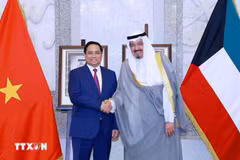 Le Premier ministre Pham Minh Chinh et son homologue du Koweït. Photo: VNA