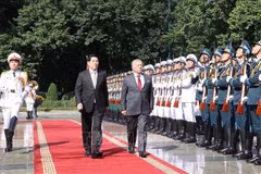 Le président du Vietnam, Luong Cuong (à gauche), et le roi de Jordanie, Abdullah II Ibn Al Hussein. Photo: VNA